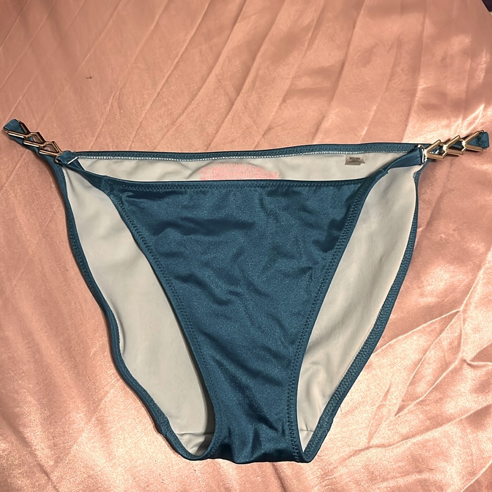These are Victoria Secret bathing suit bottoms. Size M